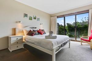 Voodi või voodid majutusasutuse Tura Vista - 3 bedroom Pet Friendly with Sea views toas