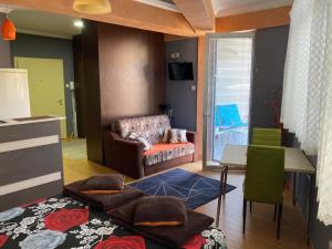 Posezení v ubytování Apartman Aischa + 23 fotografií