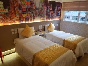 Whole Sunshine International Guest House 객실 침대