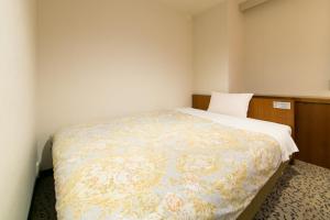 Postel nebo postele na pokoji v ubytování Hotel Ohedo