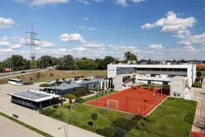 an aerial view of a building with a basketball court at Hotel Gerardus in Szeged