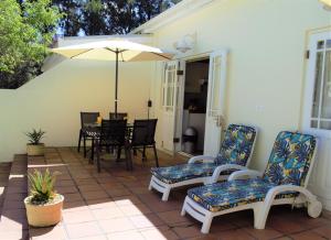 Et opholdsområde på Mafunyani Cottage