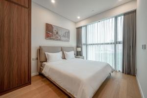 Mynd úr myndasafni af Metropole Condo City Central Sy's Home í Ho Chi Minh
