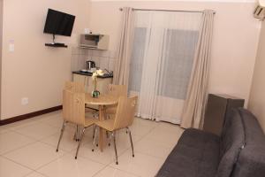 TV a/nebo společenská místnost v ubytování Aqua Stone guest house