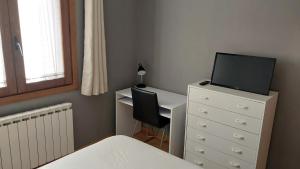 TV a/nebo společenská místnost v ubytování Apartamento en Villanua La Espata