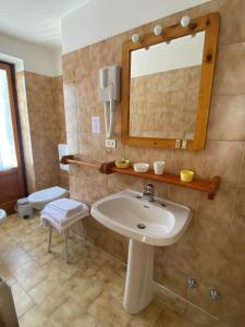 Koupelna v ubytování Hotel Col Serena