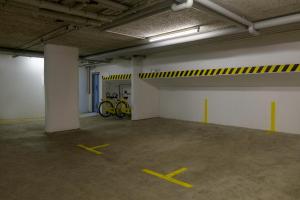 an empty parking garage with bikes parked in it at Hotel Stuttgart Sindelfingen City by Tulip Inn in Sindelfingen