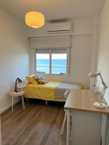 Postel nebo postele na pokoji v ubytování SAN MIGUEL PLAYA ALMERIA