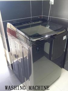 a washing machine in a kitchen with the words washing machine at Mersing Maple Villa in Mersing