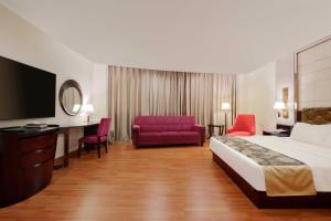 Voodi või voodid majutusasutuse Foshan Guanxin Hotel toas