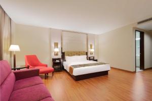 Voodi või voodid majutusasutuse Foshan Guanxin Hotel toas