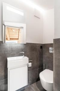 Vannituba majutusasutuses Haus Beta by Zermatt Premium Apartments
