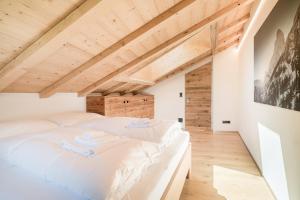 Voodi või voodid majutusasutuse Haus Beta by Zermatt Premium Apartments toas