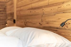 Voodi või voodid majutusasutuse Haus Beta by Zermatt Premium Apartments toas