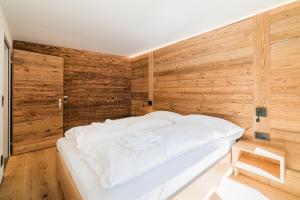 Voodi või voodid majutusasutuse Haus Beta by Zermatt Premium Apartments toas
