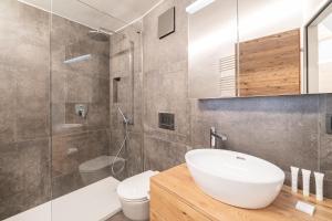 Vannituba majutusasutuses Haus Beta by Zermatt Premium Apartments