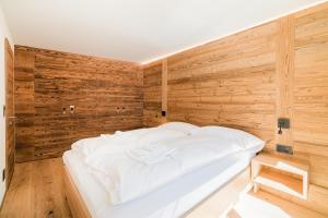 Voodi või voodid majutusasutuse Haus Beta by Zermatt Premium Apartments toas