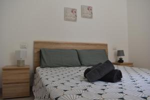 Postel nebo postele na pokoji v ubytování La Corte di Crenna