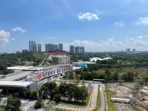 a view of a building with a city in the background at Walk to Legoland, Kid Lego Toys, D'Pristine Medini in Nusajaya