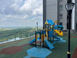 a playground on the side of a building at Walk to Legoland, Kid Lego Toys, D'Pristine Medini in Nusajaya