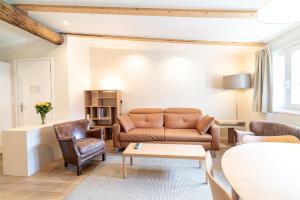 Posezení v ubytování Haus Kirchplatz 4 by Zermatt Premium Apartments