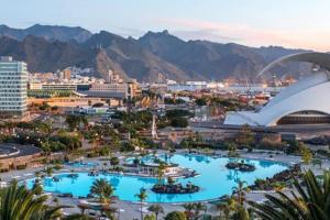 a view of a city with two swimming pools at NUEVA: Casa La Hondura in Las Eras