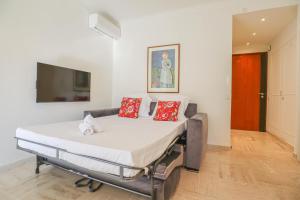 Katil atau katil-katil dalam bilik di « Hawai » Proche Mer, Calme, Piscine