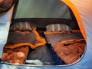 Tempat tidur dalam kamar di Gibaland