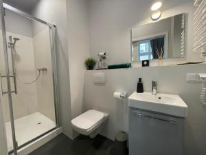 Kúpeľňa v ubytovaní Piotrkowska122 Studio Apartments + 31 fotografií
