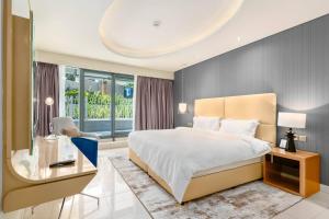 Fotografie z fotogalerie ubytování White Sage - Glamorous & Spacious 2BR at DAMAC Paramount Towers v Dubaji