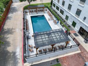 an overhead view of a swimming pool on a building at Hampton Inn & Suites Denton in Denton