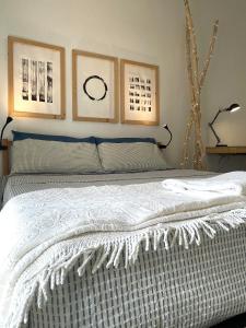 Ένα ή περισσότερα κρεβάτια σε δωμάτιο στο EASYSTAY BARI Rooms