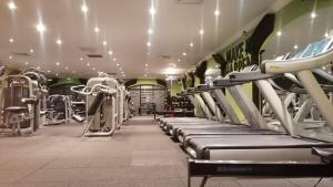 a gym with rows of treadmills and machines at The Glenview Hotel & Leisure Club in Newtown Mount Kennedy
