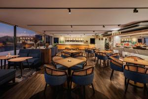Veitingastaður eða matsölustaður á DoubleTree by Hilton Damai Laut