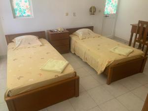 Uma cama ou camas num quarto em Residencial Pôr do Sol