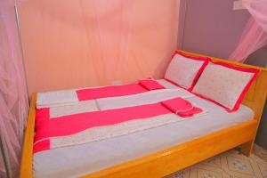 Postel nebo postele na pokoji v ubytování Scindia Suites hotel