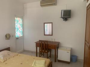 Uma televisão e/ou sistema de entretenimento em Residencial Pôr do Sol