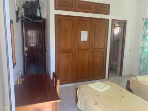 Uma cama ou camas num quarto em Residencial Pôr do Sol