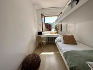 A bed or beds in a room at Apartamento Socotor, céntrico, vistas , garaje y Wifi