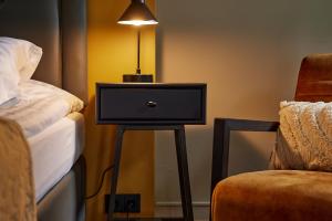 Postel nebo postele na pokoji v ubytování Hotel Frón