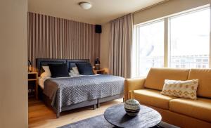 Postel nebo postele na pokoji v ubytování Hotel Frón
