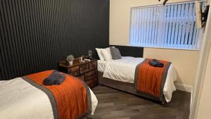 Postel nebo postele na pokoji v ubytování ANFIELD PLACE TO STAY