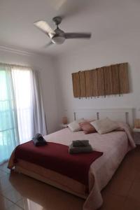 Postel nebo postele na pokoji v ubytování Brisas de Puerto Rico + 10 fotografií