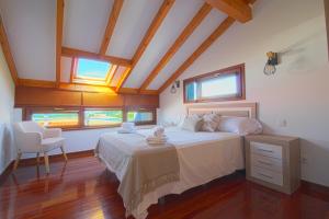 Un pat sau paturi într-o cameră la El Rincón del Mar