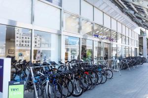a bunch of bikes parked in front of a building at Bello House Imabari in Imabari