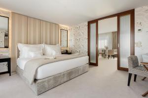 Un ou plusieurs lits dans un hébergement de l'établissement Wine & Books Porto Hotel