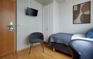 Postel nebo postele na pokoji v ubytování Hotel Frón