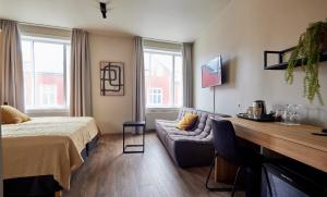 Postel nebo postele na pokoji v ubytování Hotel Frón