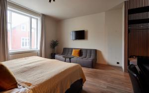 Postel nebo postele na pokoji v ubytování Hotel Frón