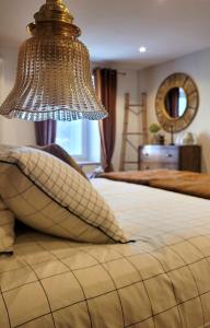 Ένα ή περισσότερα κρεβάτια σε δωμάτιο στο Chambre d'hôte à "Tandem House"